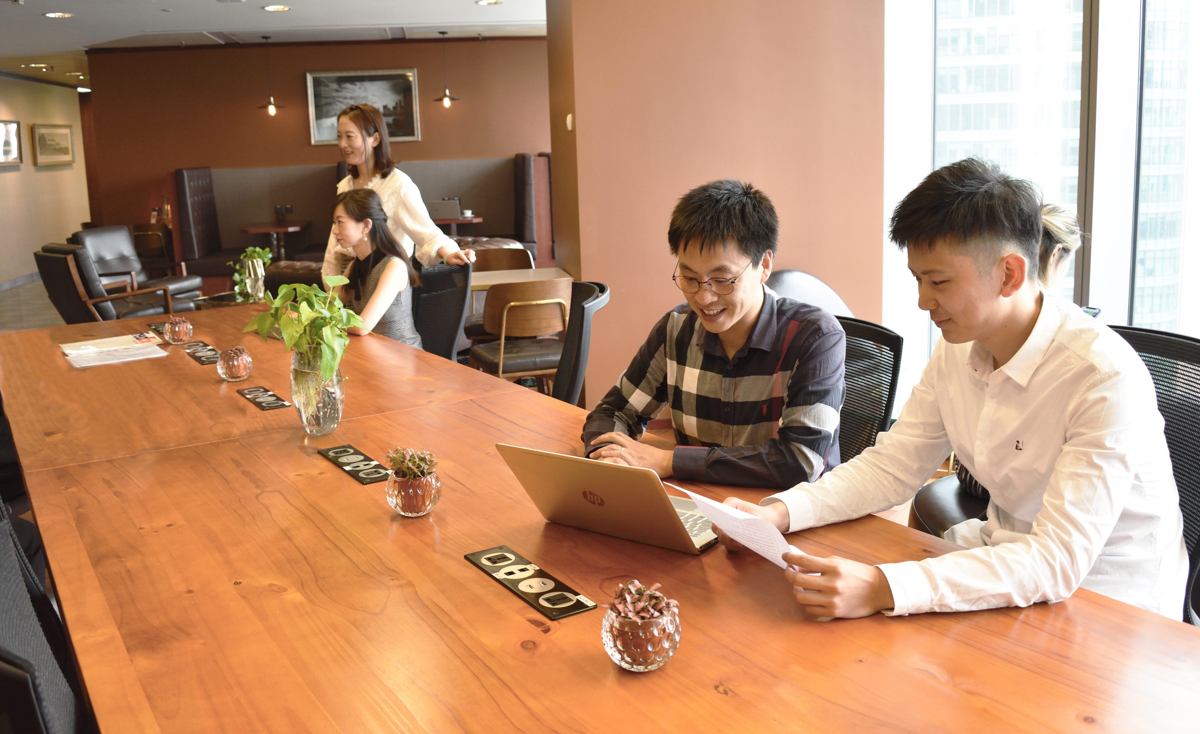 A collaborative and contemporary coworking working area at Servcorp Citigroup Tower, Shanghai, China. 